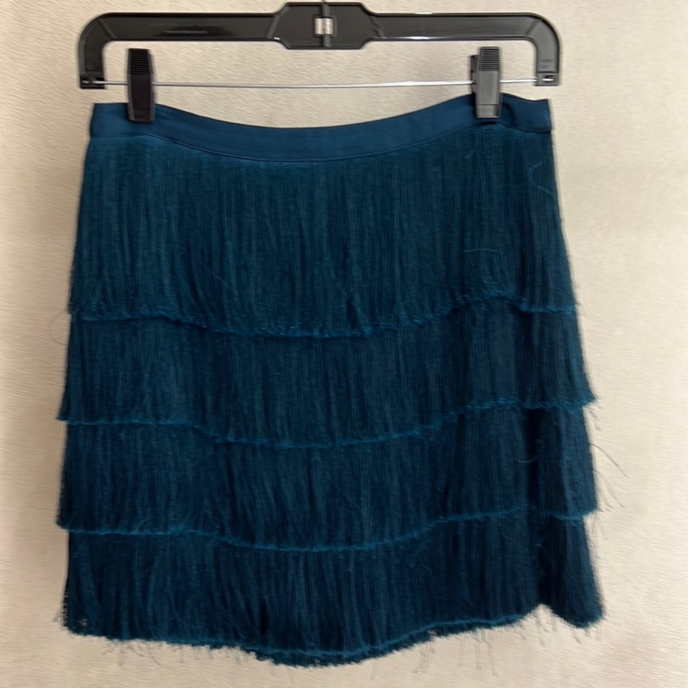 Intermix cocktail fringed mini skirt.